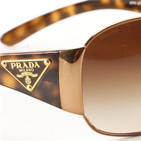 Prada Wraparound Sunglasses SPR 57L ZVA